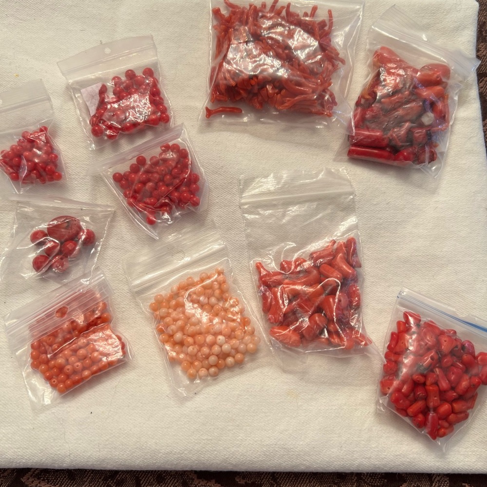 10 Packages of Loose Coral (like) Beads